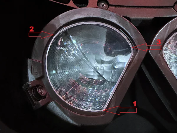 Left lens (L) in the new eye module, with red arrows showing the press order: 1 = lower (sharper) corner, 2 = upper outer edge, 3 = upper inner edge