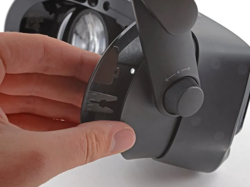 Sliding the bezel onto the headset