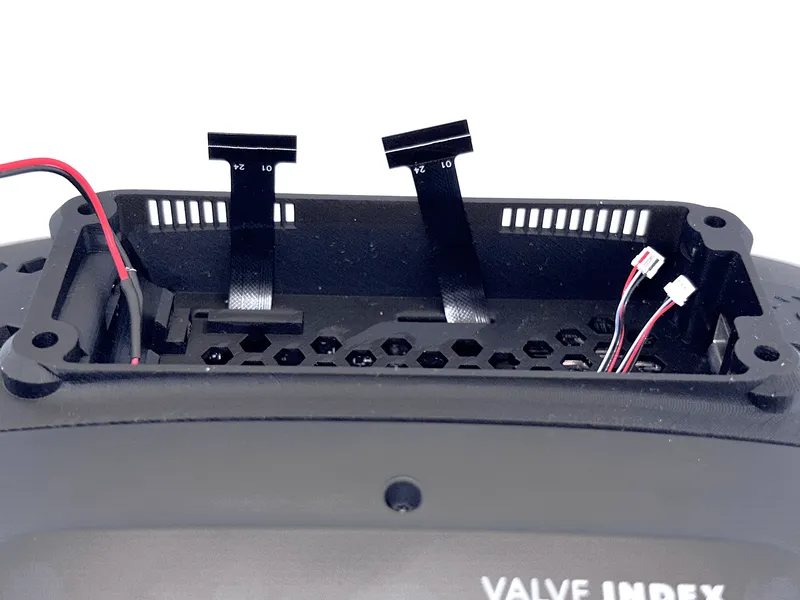 Cables extending about 1 cm beyond the frunk edge