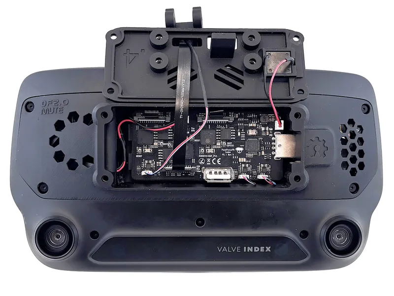 Face tracking module fed through the front cover and connected to the board